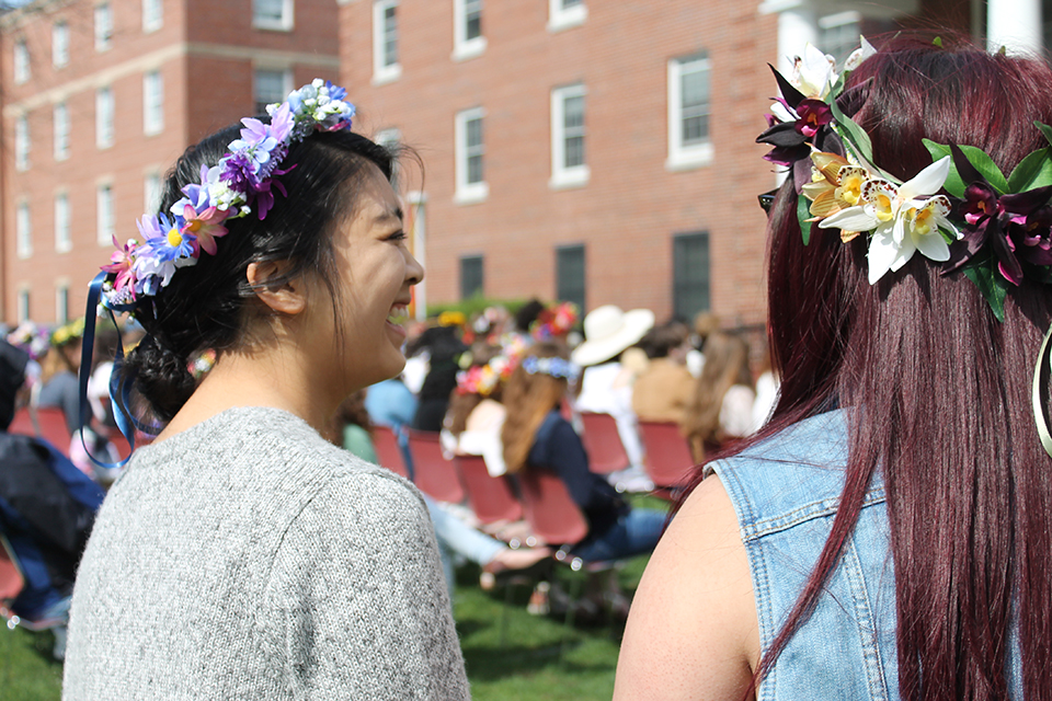 Students celebrating May Day in flower crowns