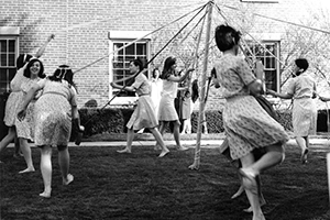 May Day - Students Dancing Around the Pole in the Same Dress