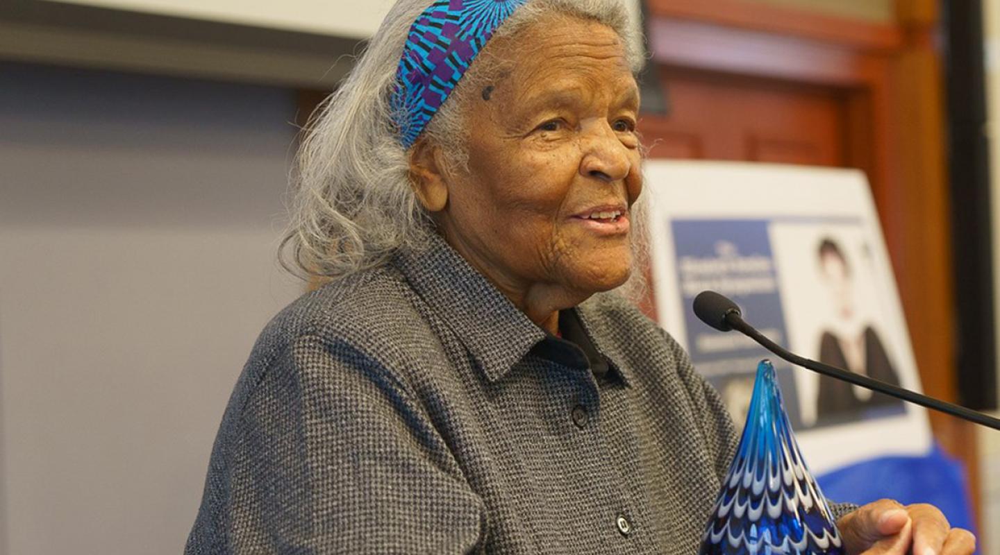 Elizabeth Rawlins at the podium during the 2023 Black Alumnae Symposium