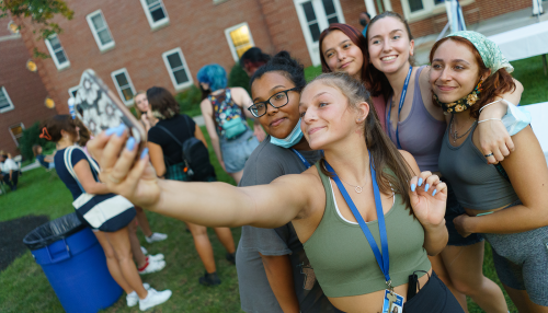 A group of Simmons students taking a selfie during Orientation