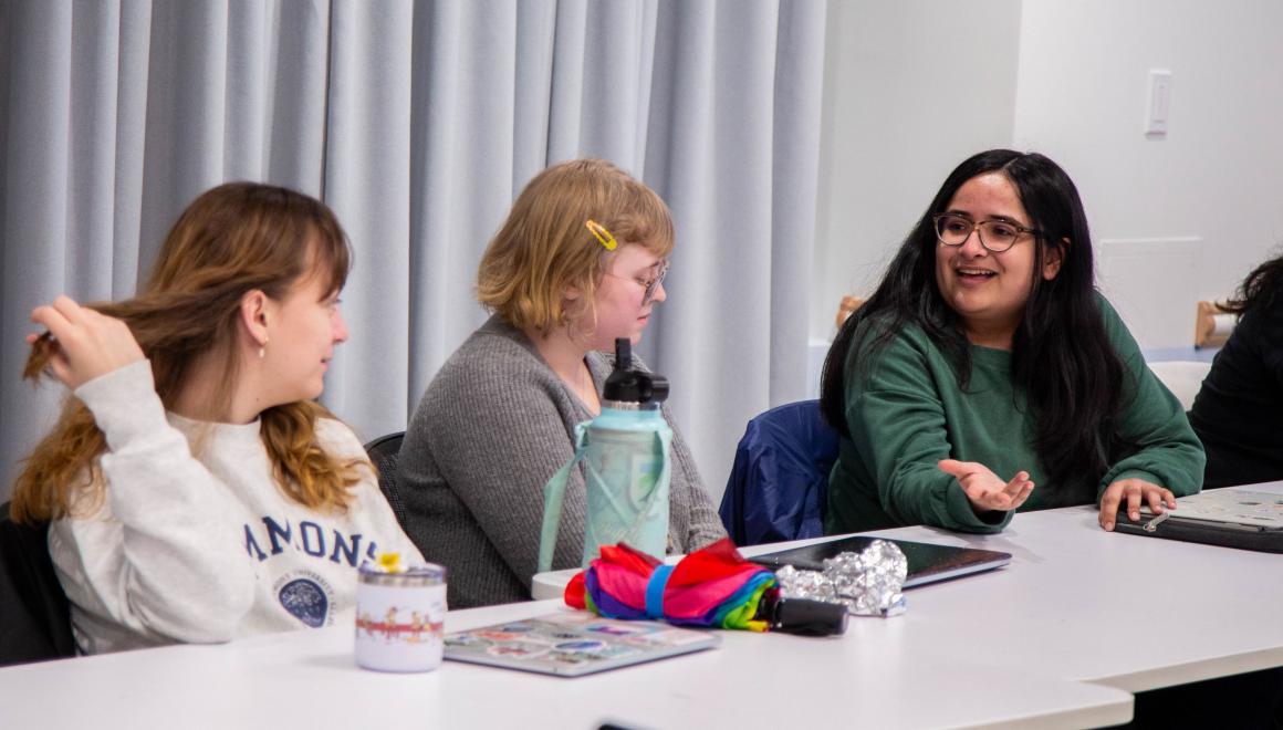 Three Simmons students in a media studies class.