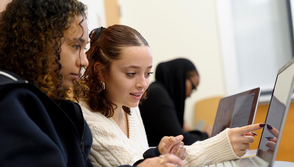 Students collaborating in class