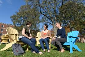 Students sitting on the residential campus