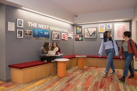 Students walking through the Ifill School wing