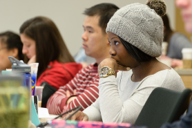 A classroom of graduate students at Simmons University