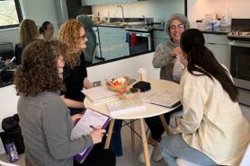 A group of Nutrition students around a table