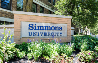 A brick sign for Simmons University