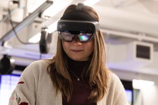 Woman wearing Hololens goggles