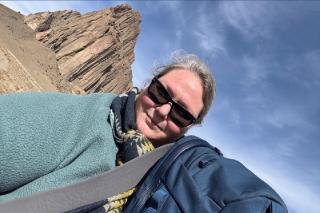 Susan Perron ’18 in front of the Shiprock known as the winged rock in Navajo