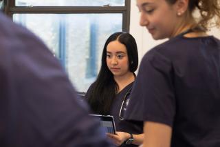 Nursing students working in the simulation lab