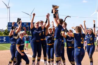 The Simmons softball team celebrating a victory