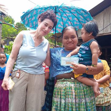 Fern Remedi-Brown with woman and child in Guatemala