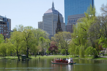 The Boston Public Garden and the pond with a swan boat 