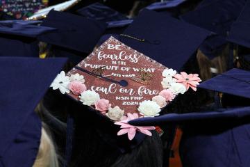 Commencement cap with the message “Be fearless in the pursuit of what sets your soul on fire”