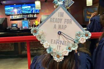 Commencement cap with the message “I'm ready for a nap. I earned it.”