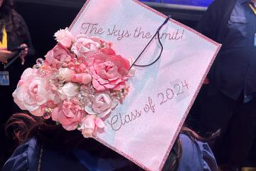Commencement cap with the message “The skys the limit! Class of 2024”
