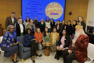 The Simmons community celebrates Gwen Ifill's life and legacy. Included in the group are Simmons President Lynn Perry Wooten, Communications Professor Bob White, Ifill School Dean Ammina Kothari, Social Work Dean Michael LaSala, and SLIS Dean Sanda Erdelez.