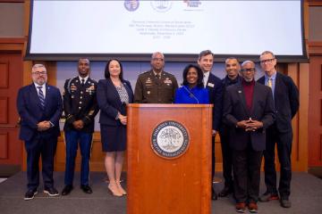 The group of speakers at the Veteran's Day program, including General Gary M. Brito and Simmons President Lynn Perry Wooten