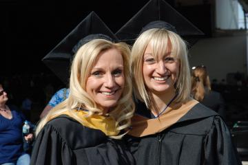 Graduates Karen MacKenzie '10,'12MSW and daughter Jen DiRico '12MBA at the 2012 Simmons Commencement.