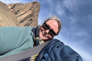 Susan Perron ’18 in front of the Shiprock known as the winged rock in Navajo