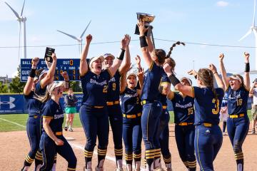 The Simmons softball team celebrating a victory