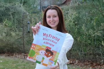 Maggie Spadaro '25 with her new book "My Friend Doesn't Have a House"