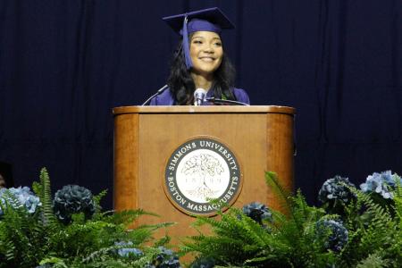 Undergraduate student speaker Azeemah Solomon at the podium during the 2024 Commencement ceremony