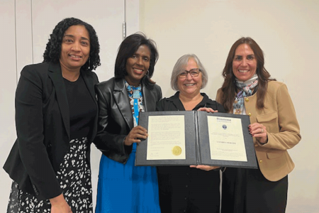 Dean Ammina Kothari, President Lynn Wooten, Professor Cathryn Mercier, and Provost Stephanie Cosner at the 2024 Faculty Awards