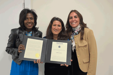 President Lynn Wooten, Professor Arpita Saha, and Provost Stephanie Cosner at the 2024 Faculty Awards