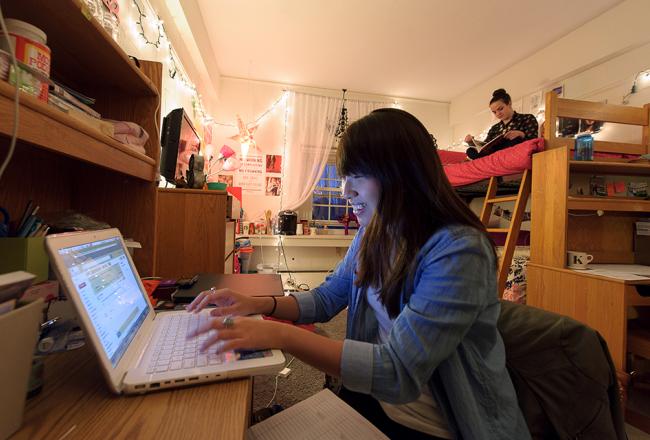 Students sitting in their dorm room