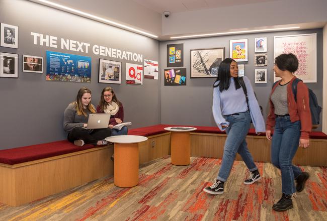 Students walking through the Gwen Ifill School wing.