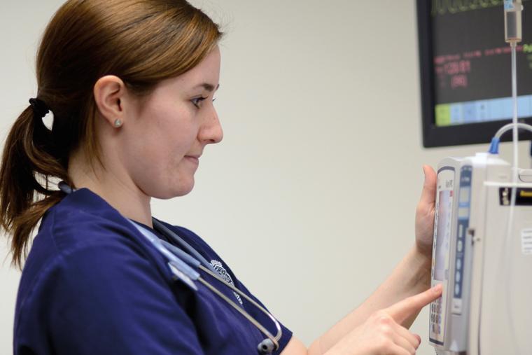 Nursing student in a patient room