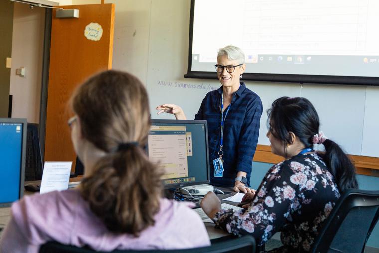 Professor Nanette Veilleux teaching a class of Simmons University students