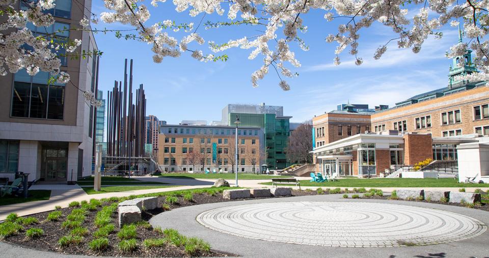 The Simmons academic campus in Spring, 2024.  The construction of the new Living Learning Center is visible.