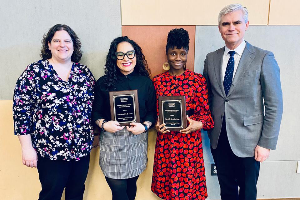 Dr. Jennifer Herman, Professor Tatiana Cruz, Professor Kamille Gentles-Peart, and NEBHE President and CEO Dr. Michael Thomas at the International Women's Day Breakfast and Awards.